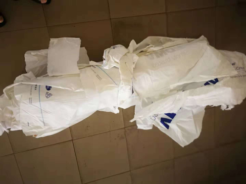 海南海口椰树集团采购越都科技纤维切断机用于粉碎装椰肉带塑料的纸袋子粉碎切断机 粉碎的袋子样品2